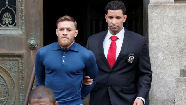 Conor Mcgregor Being Led From Court